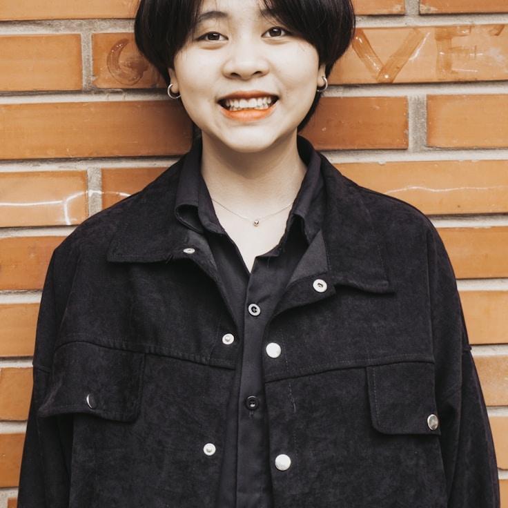 Alex Carter, Lead Design Curator at Stoic Garden Field, reviewing corporate floral arrangements